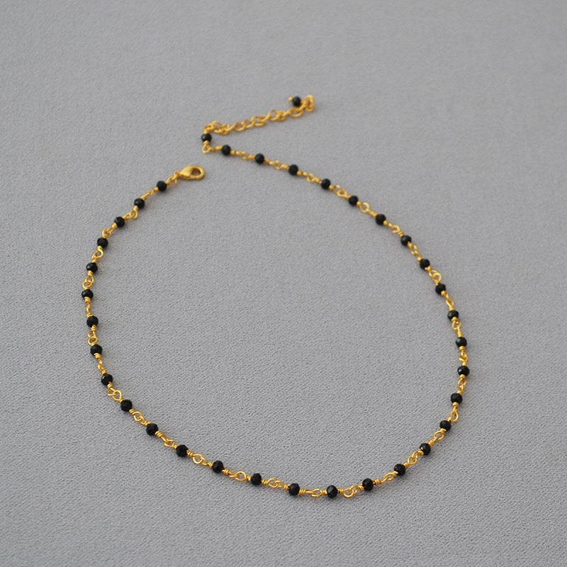 Woven Gold-Plated Choker with Faceted Black Crystals