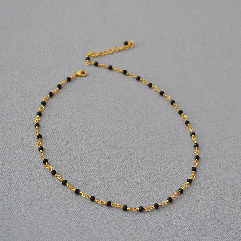 Woven Gold-Plated Choker with Faceted Black Crystals