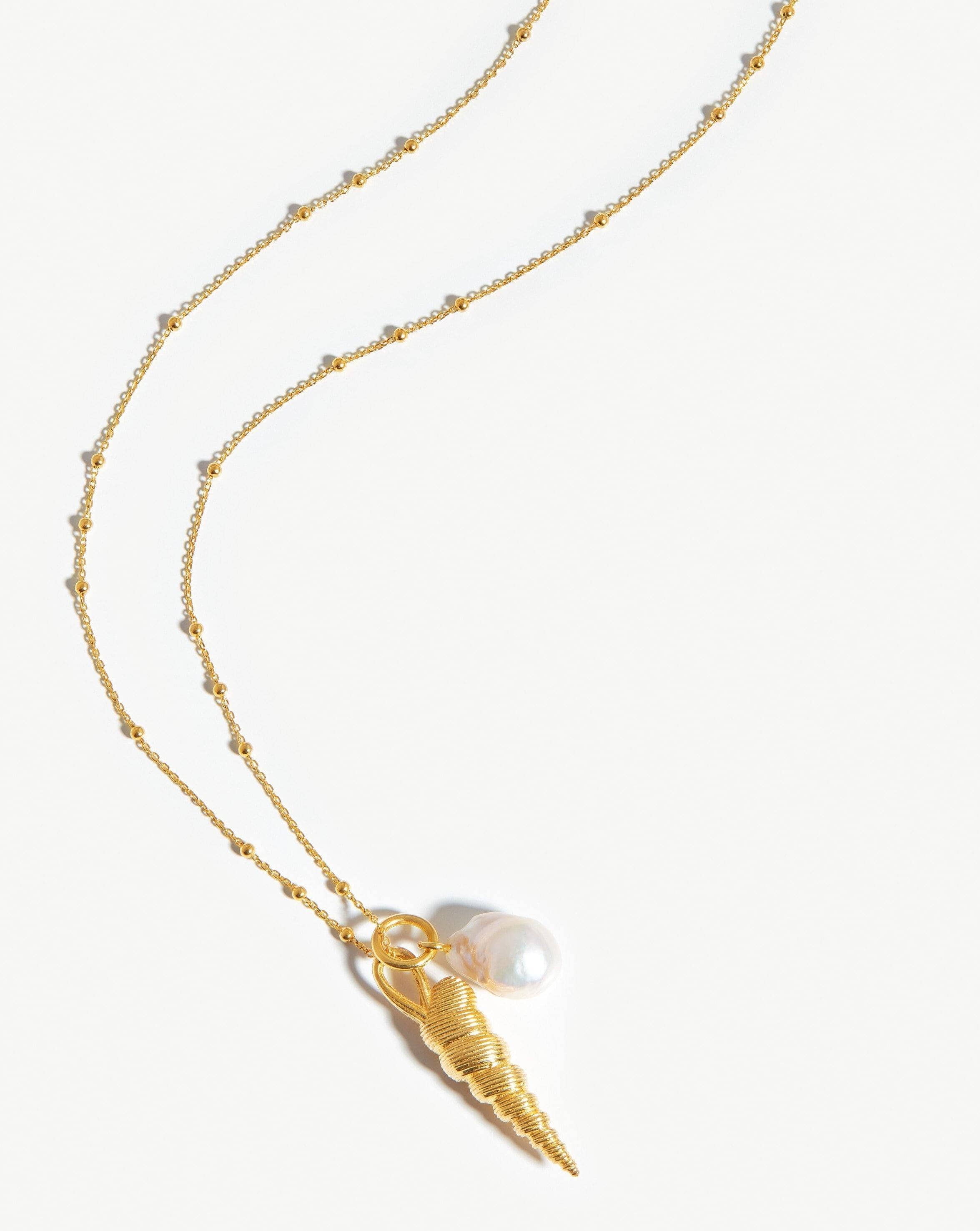 baroque-pearl-spiral-shell-pendant-necklace-18ct-gold-platedpearl-necklaces-missoma-limited-168665_9b1404d8-675a-417f-ad0b-302892061a54.jpg