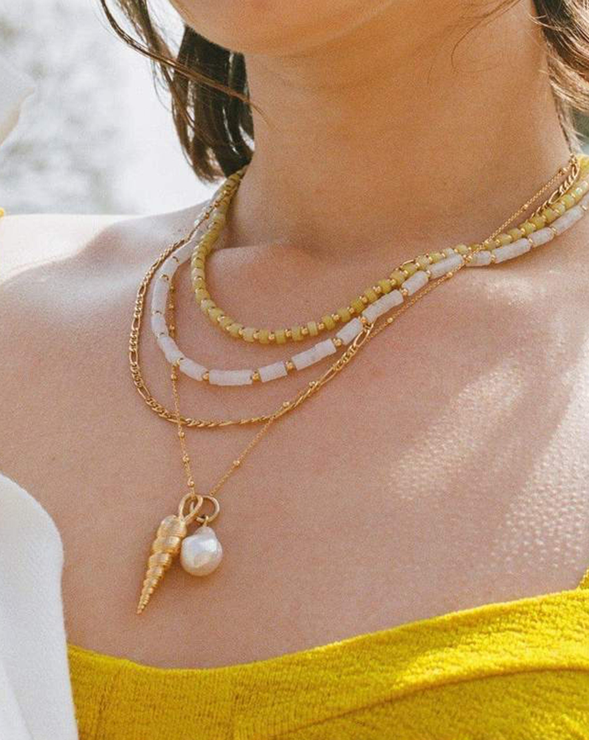 baroque-pearl-spiral-shell-pendant-necklace-18ct-gold-platedpearl-necklaces-missoma-limited-544209_b9b84b7b-6bd8-4cab-a0de-406f742b89c6.jpg