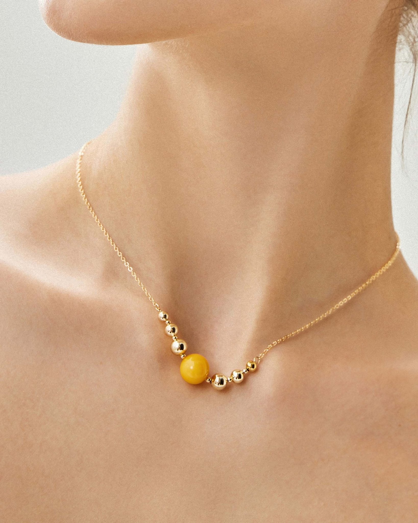 beeswax-amber-necklace-858706_dc744bab-e674-447a-8077-cab89a439f6c.jpg