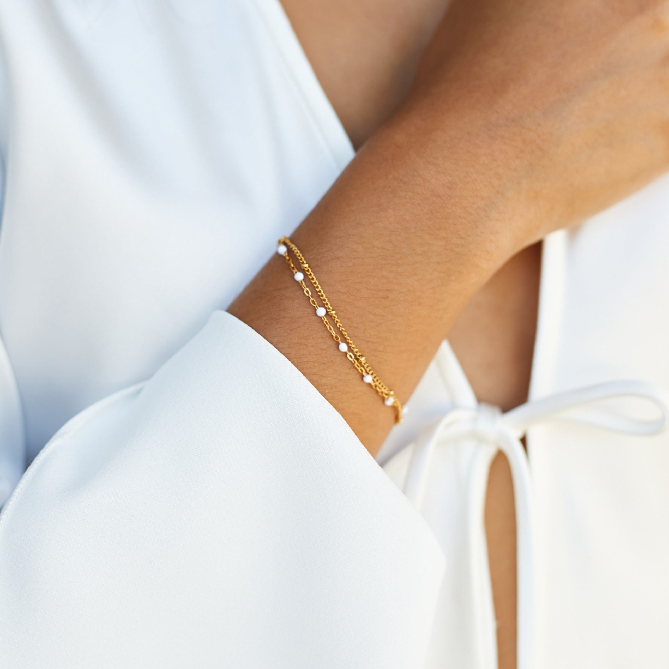 dainty-white-bracelet_2a3204b7-6e8d-4855-9fb0-5403fcdcc83d.jpg