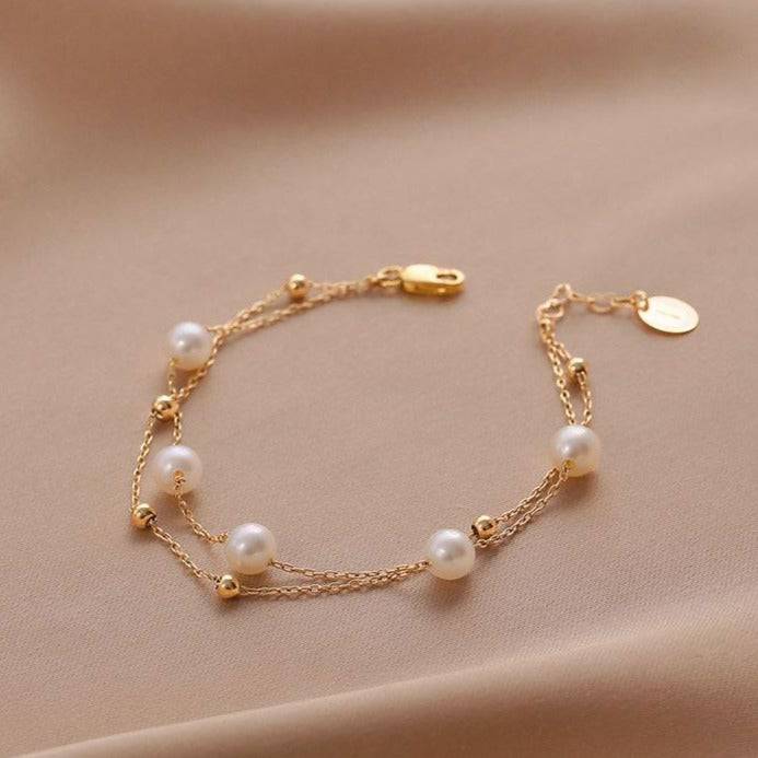 dr-bracelets-layered-freshwater-pearl-bracelet-14k-yellow-gold-36626634735849_e55a1244-ee8e-43ef-93aa-ad1db1fad2dd.jpg