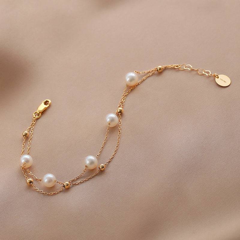 dr-bracelets-layered-freshwater-pearl-bracelet-14k-yellow-gold-36626635161833_8257ace9-44c3-4127-9426-d81501796281.jpg