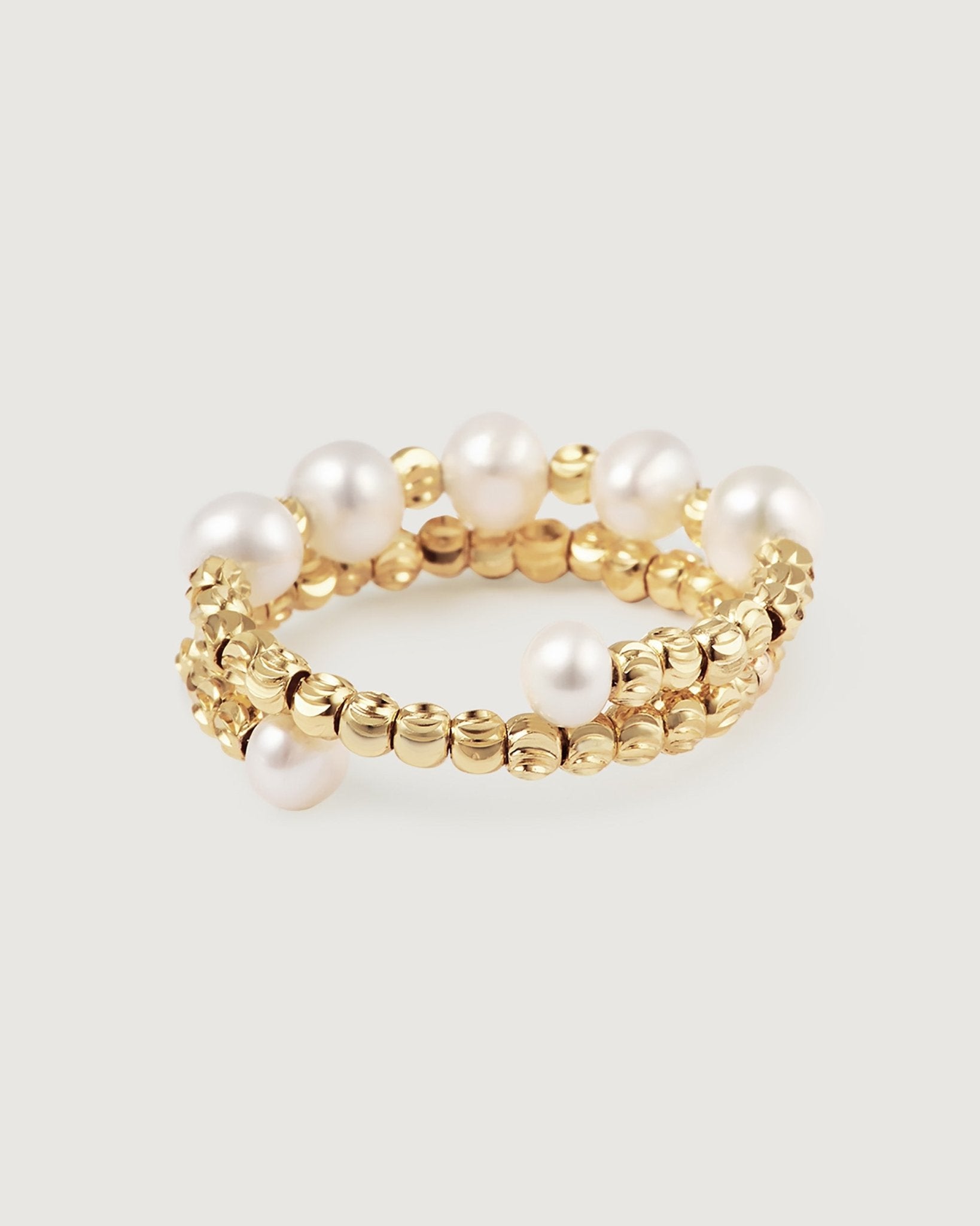 elegant-pearl-ring-on-elastic-195515_a799de37-5082-47b2-adcb-804367a44063.jpg