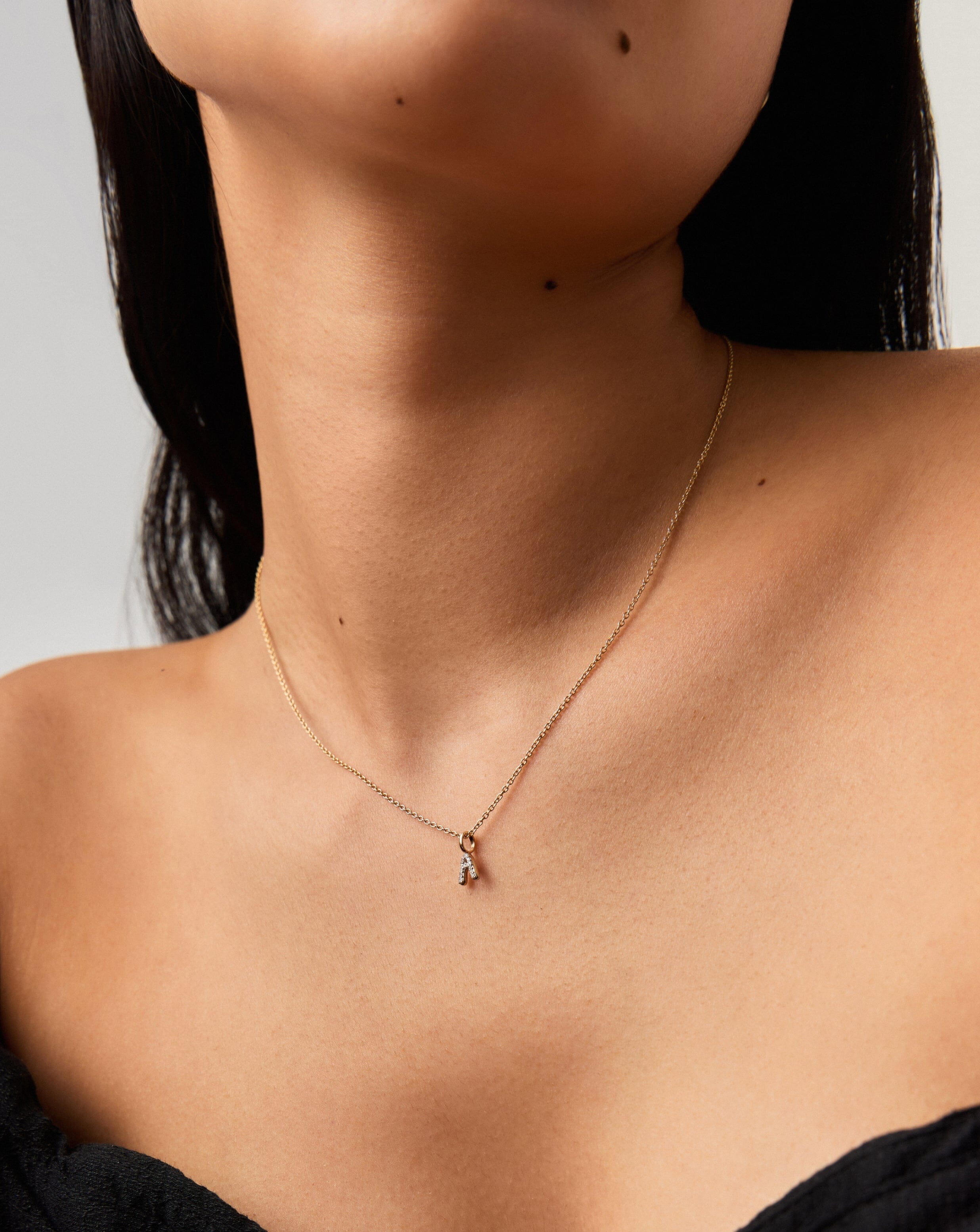 fine-diamond-initial-mini-pendant-necklace-a-14k-solid-yellow-gold-plateddiamond-necklaces-missoma-733810_75d5f7f4-0dd1-4746-b428-80e37cfedf0f.jpg