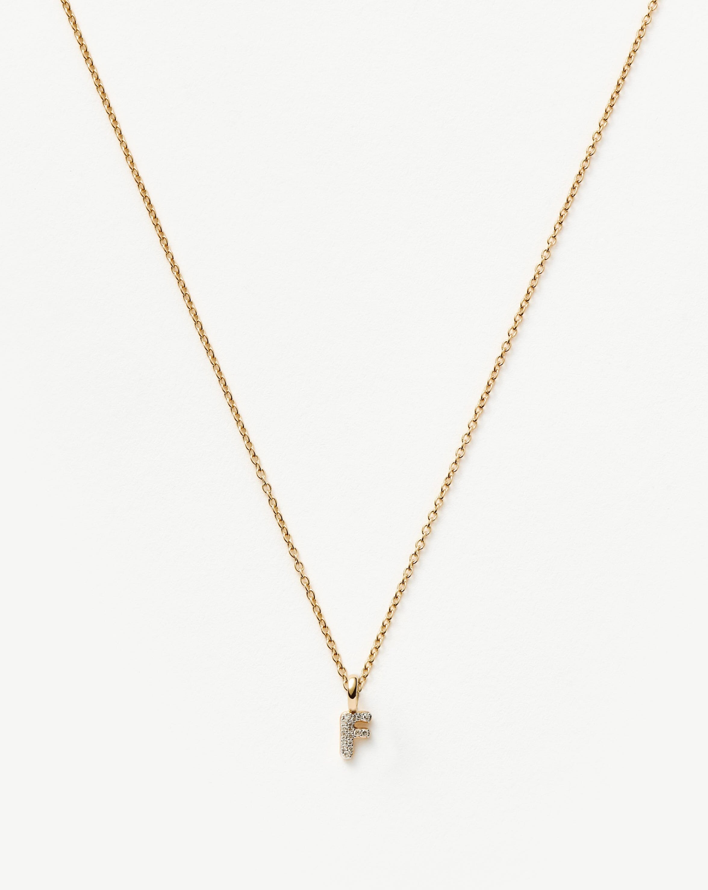 fine-diamond-initial-mini-pendant-necklace-f-14k-solid-yellow-gold-plateddiamond-necklaces-missoma-278751_fad52a9b-b188-4216-a080-27fe69bd0bb3.jpg