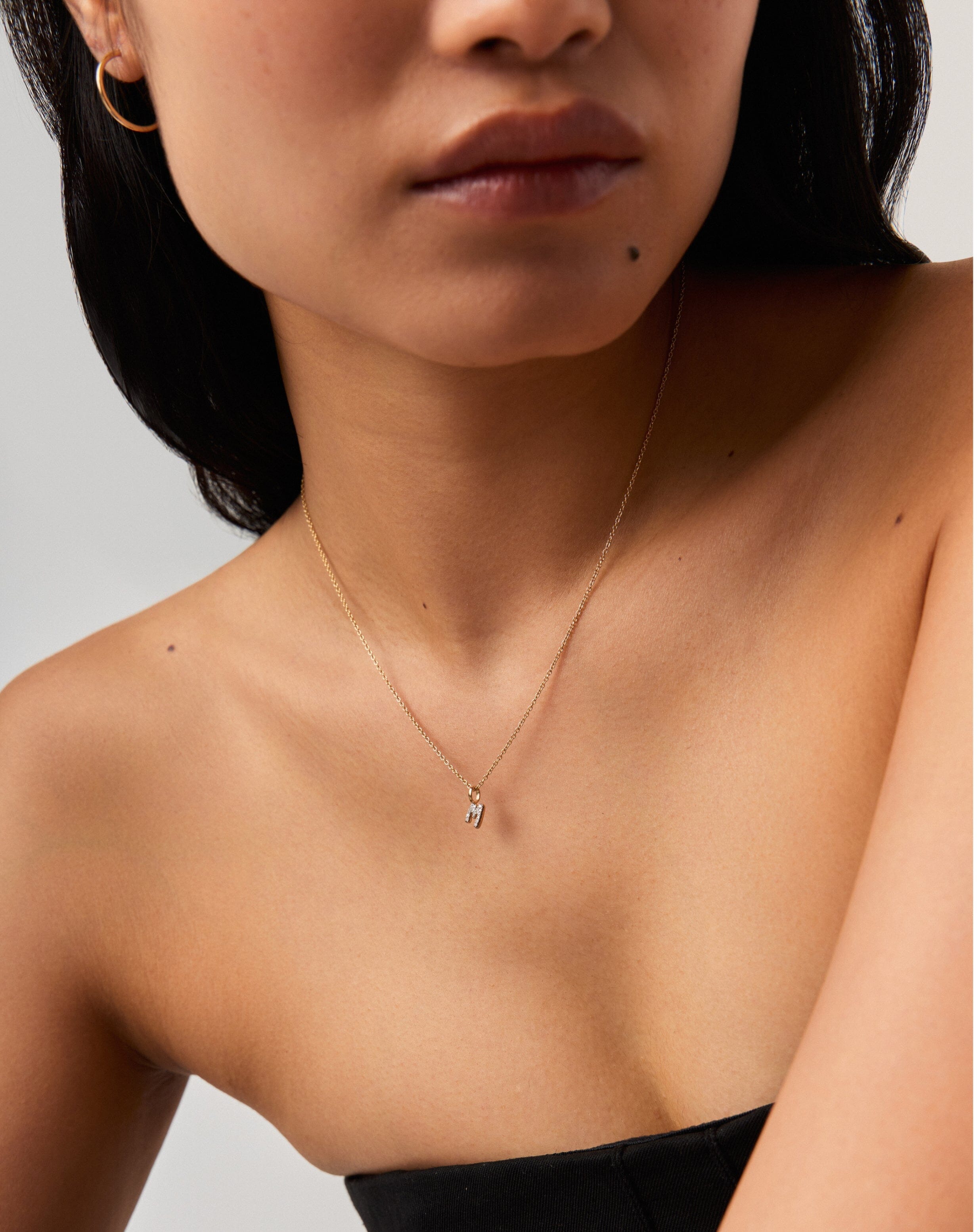 fine-diamond-initial-mini-pendant-necklace-m-14k-solid-yellow-gold-plateddiamond-necklaces-missoma-168916_66f25f27-2f2f-447d-9acf-8991068da115.jpg