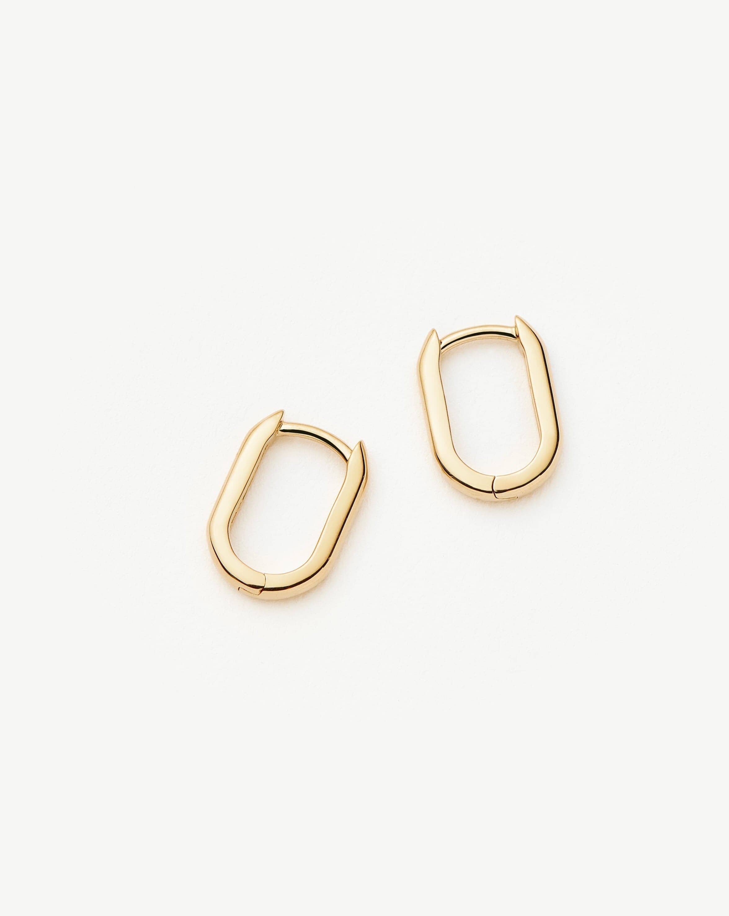 fine-ovate-mini-hoop-earrings-14k-solid-gold-earrings-missoma-176334_0a7700a4-dd24-4850-8fb8-39118bc209f3.jpg