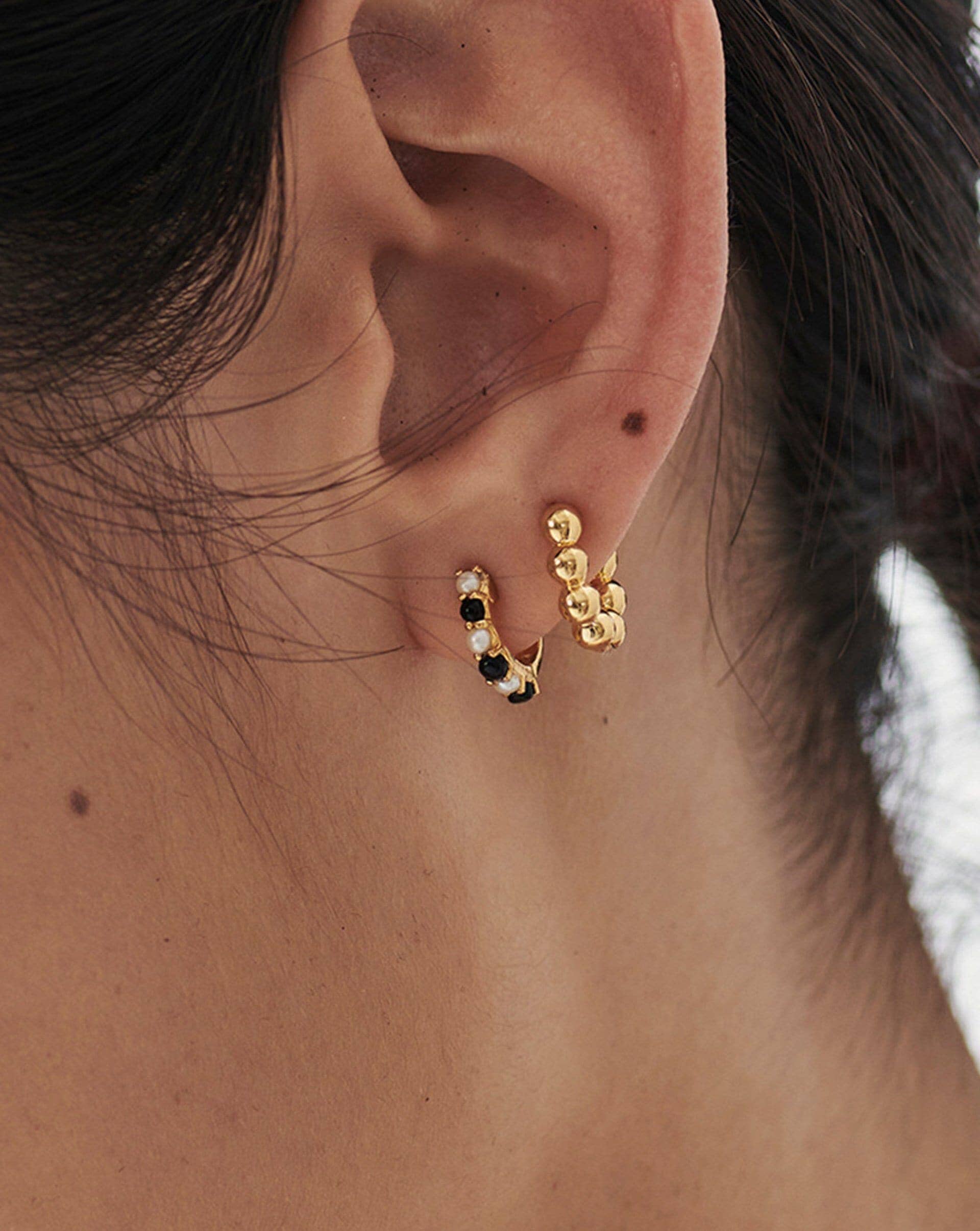 gemstone-huggies-18k-gold-vermeilpearl-black-onyx-earrings-missoma-152540_c888b728-87e4-43da-b3bb-8af73063b41d.jpg