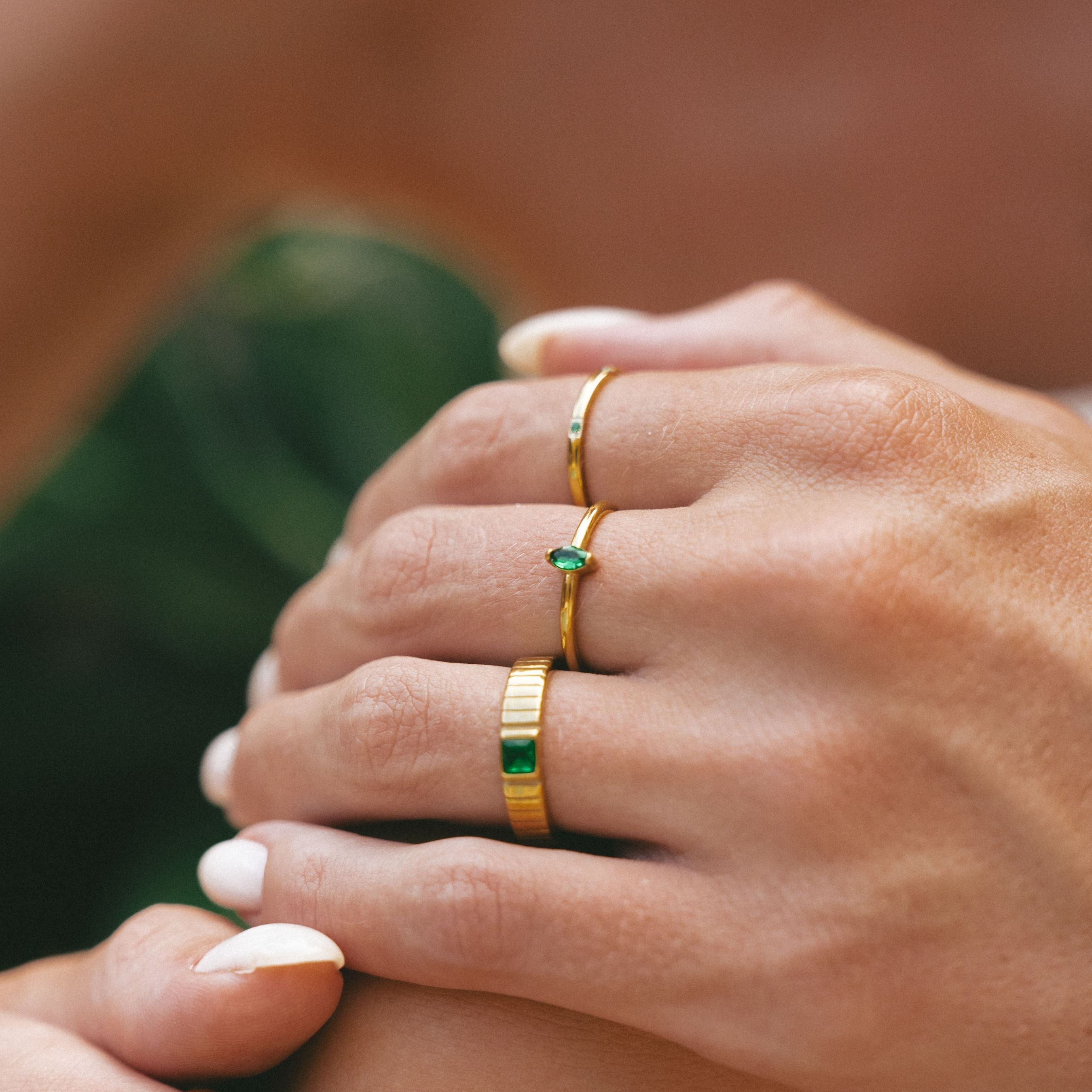 gold-green-rings_6e6bb4f3-9955-49a8-ab8b-112e7c808d98.jpg