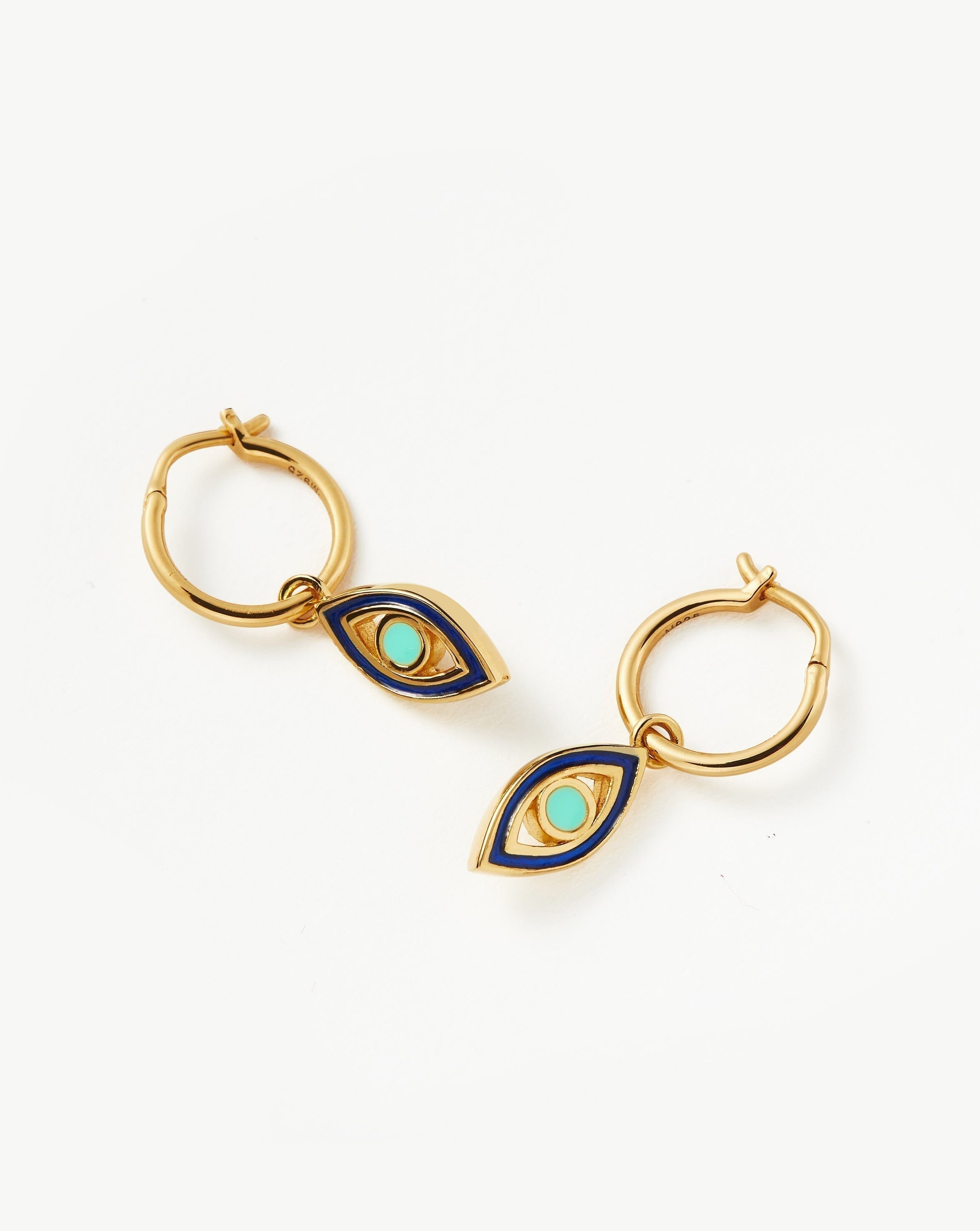 good-vibes-enamel-evil-eye-mini-charm-hoop-earrings-18ct-gold-plated-vermeilaqua-navy-earrings-missoma-966448_69610bc3-02e9-475f-99cc-cf4f2cdbc6dc.jpg