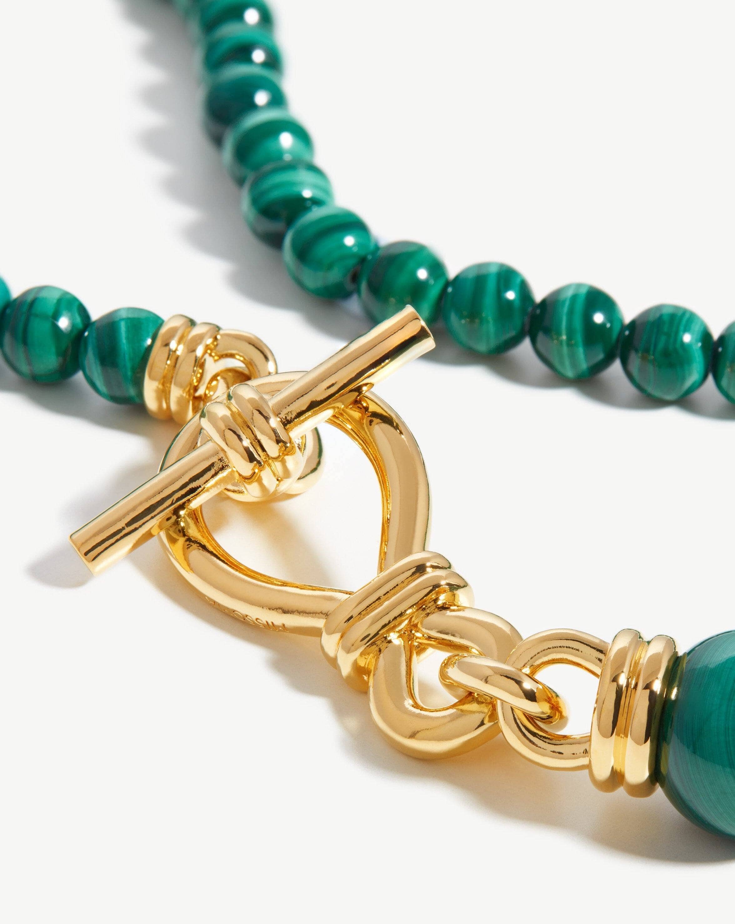 graduated-sphere-t-bar-necklace-18ct-gold-platedmalachite-necklaces-missoma-114451_ddec53f9-ca08-4d22-b089-12f228c15b31.jpg