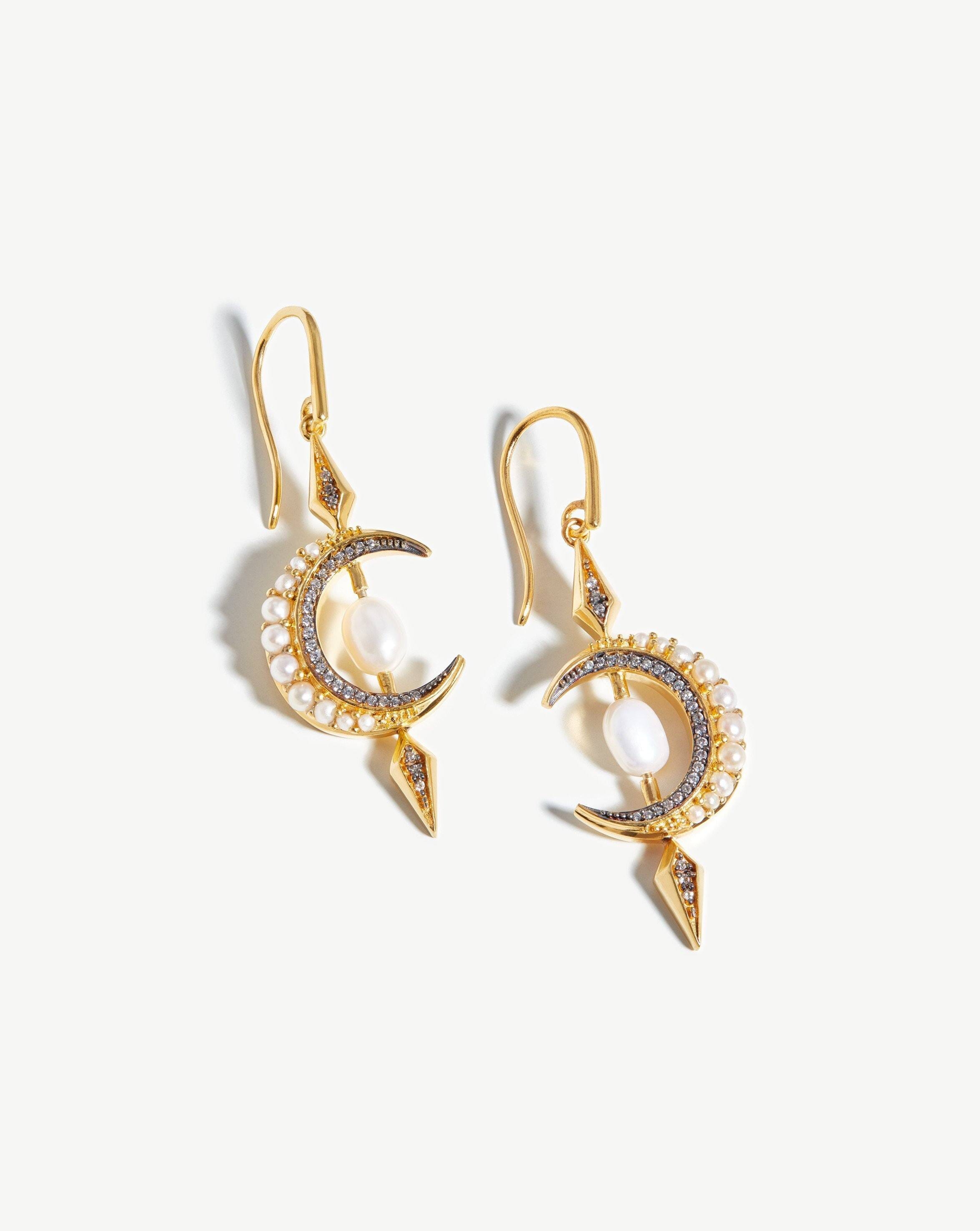 harris-reed-crescent-moon-pearl-earrings-18ct-gold-plated-vermeilpearl-earrings-missoma-536747_8e2b41c5-7943-48e2-b2c6-95ab83ba055a.jpg