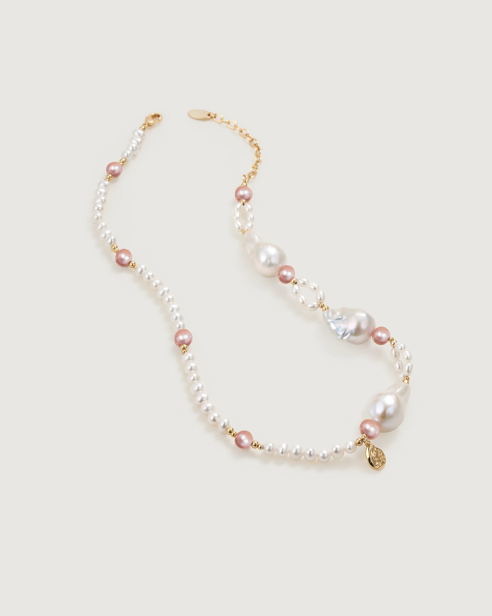 sea-garden-pearl-necklace-384013_f6f15d67-f4c6-4c63-9b01-3bb997938e61.jpg