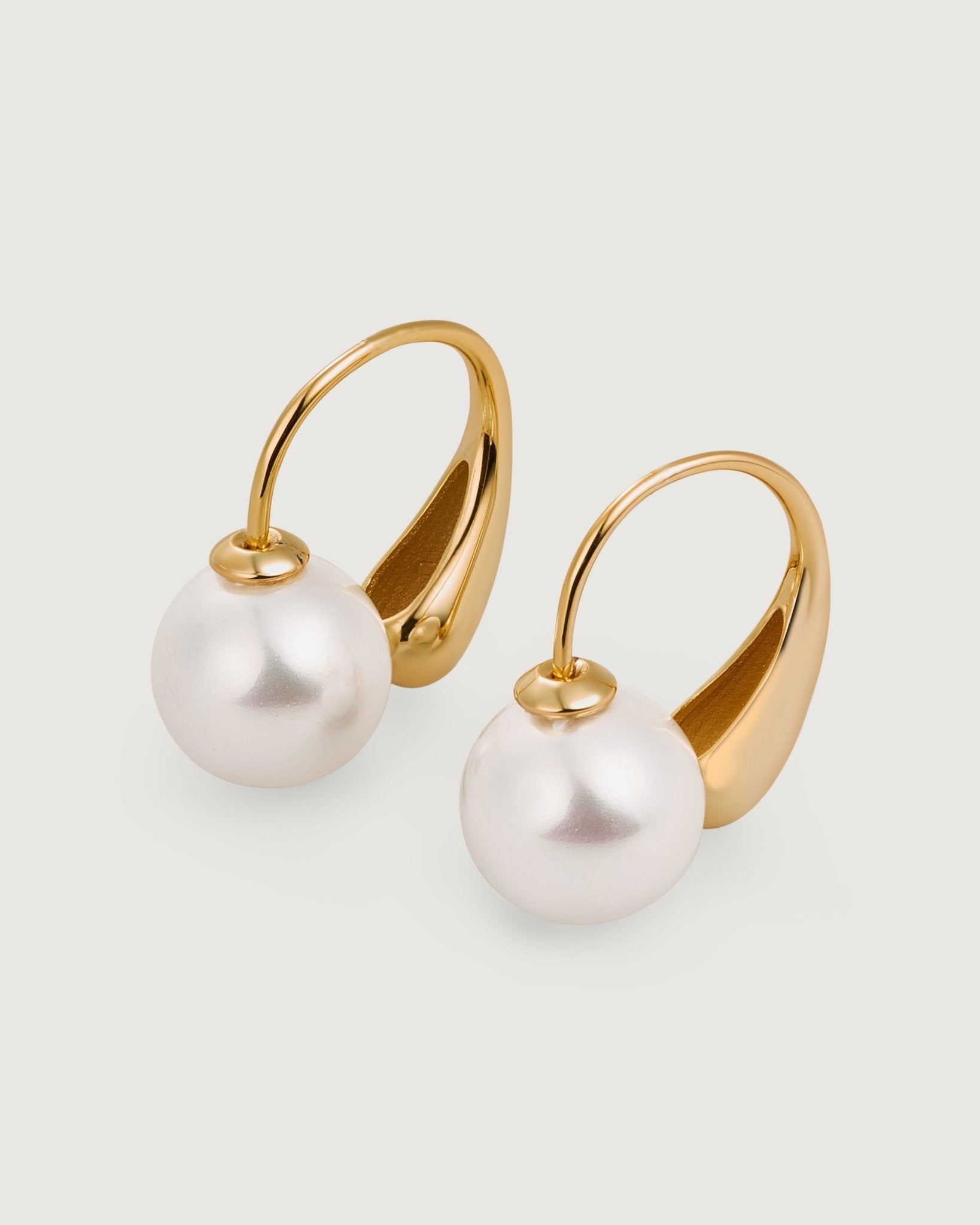 shine-pearl-earring-472554_c6b5524f-0c91-4405-b344-9991e46d8884.jpg