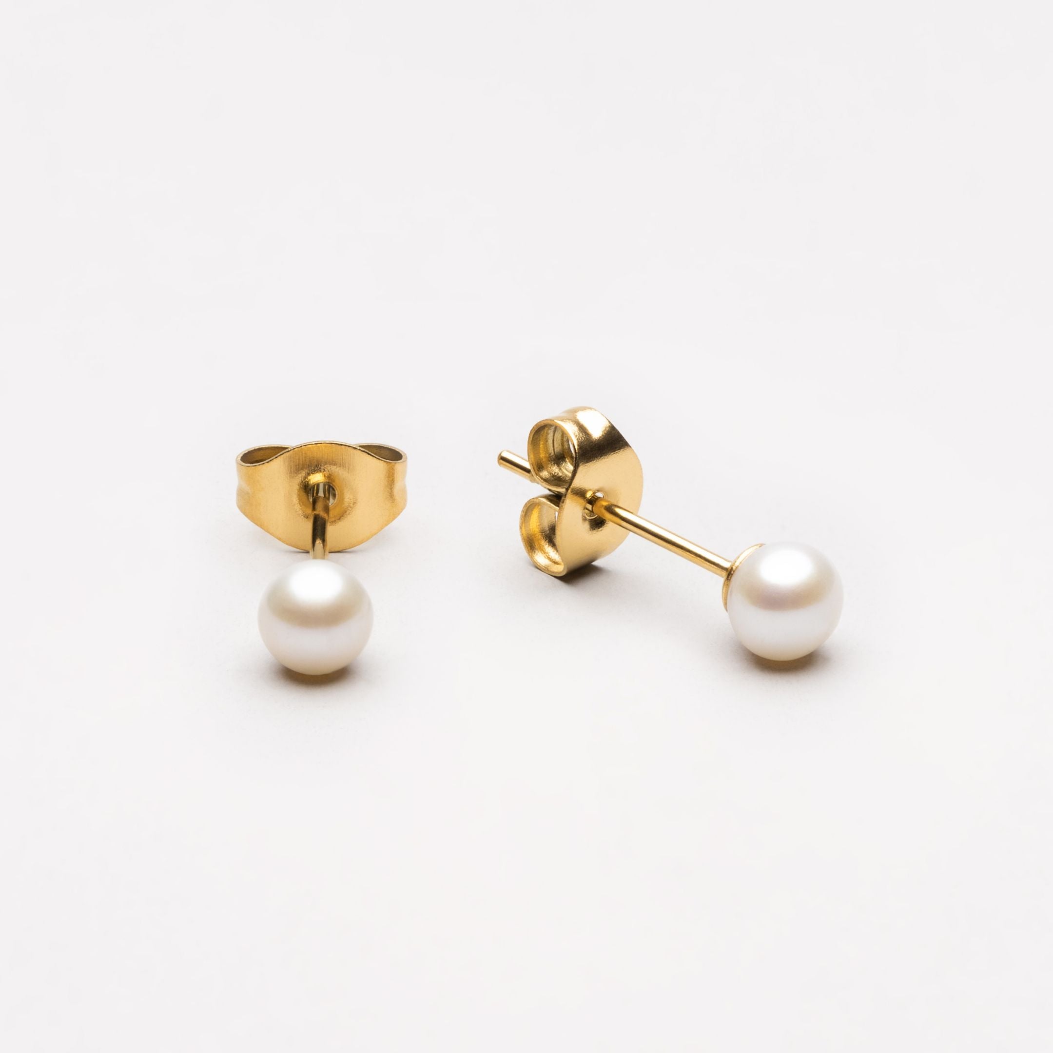 small-pearl-stud-earrings_0fd81d5e-a279-416d-9a72-646d879ee631.jpg