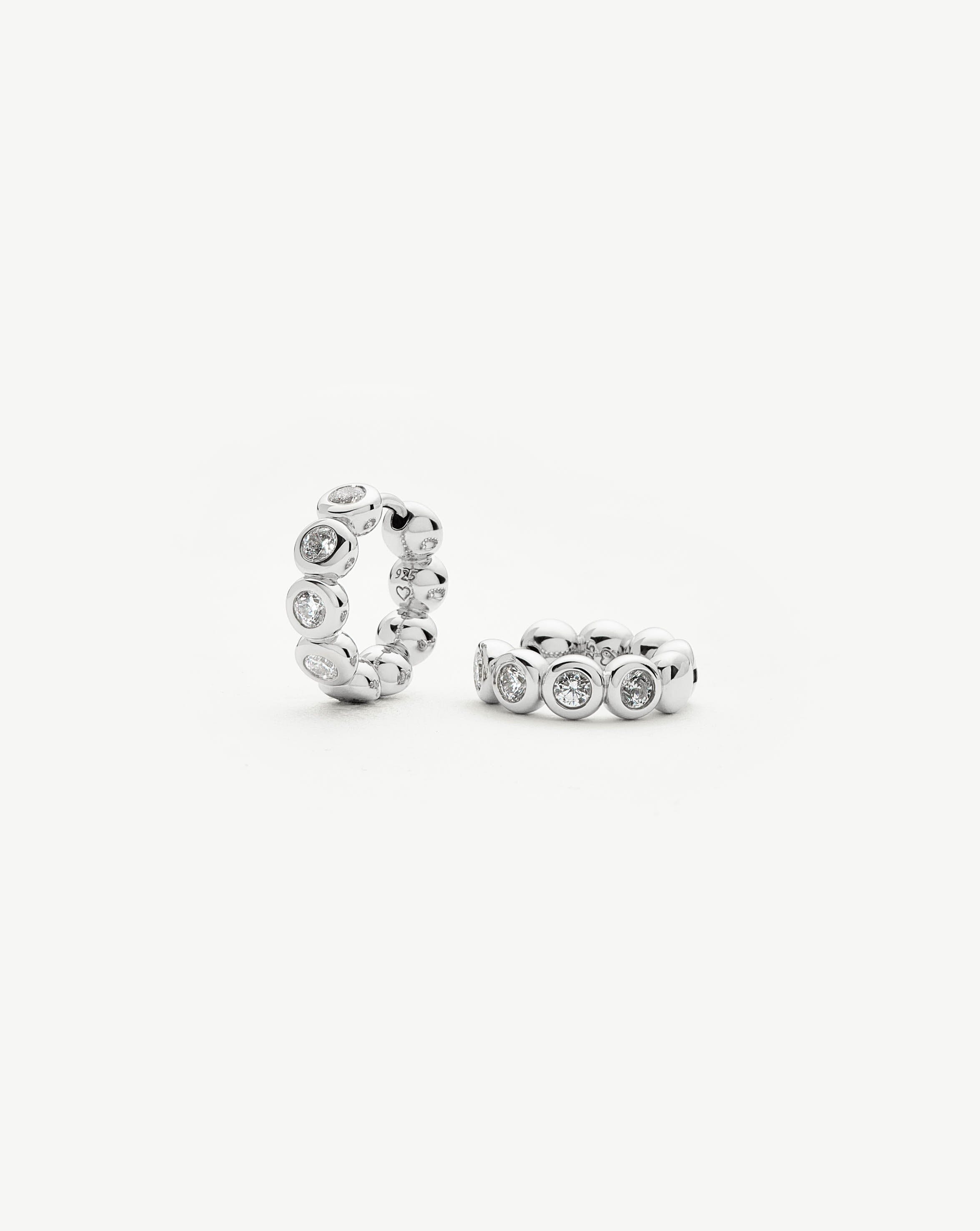 tennis-small-hoop-earrings-sterling-silver-cubic-zirconia-earrings-missoma-630099_ad60b666-6aea-4da5-beb1-c6694471e67d.jpg