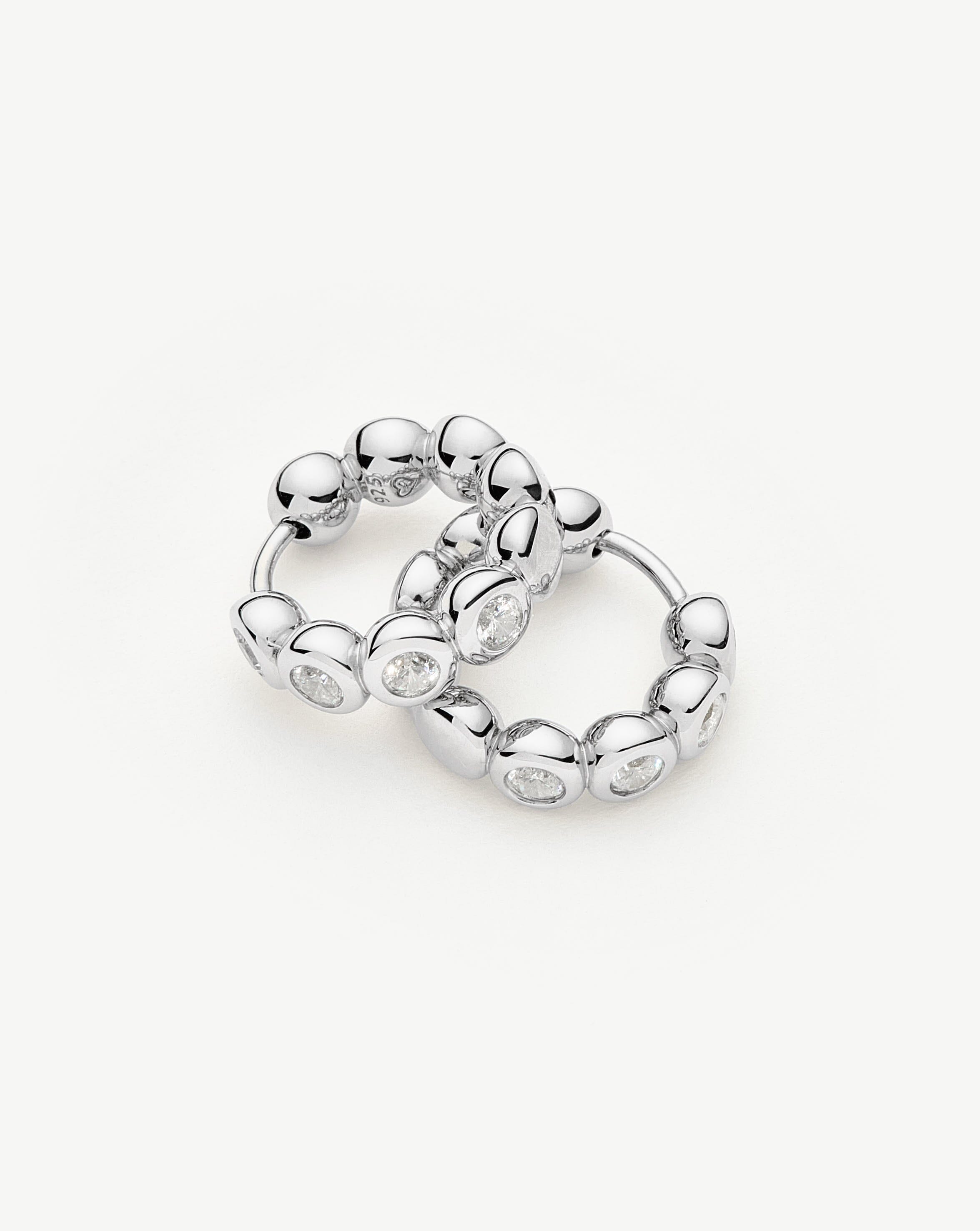 tennis-small-hoop-earrings-sterling-silver-cubic-zirconia-earrings-missoma-931096_9b16692a-0f32-46ea-8d6c-0b04ba922cf5.jpg