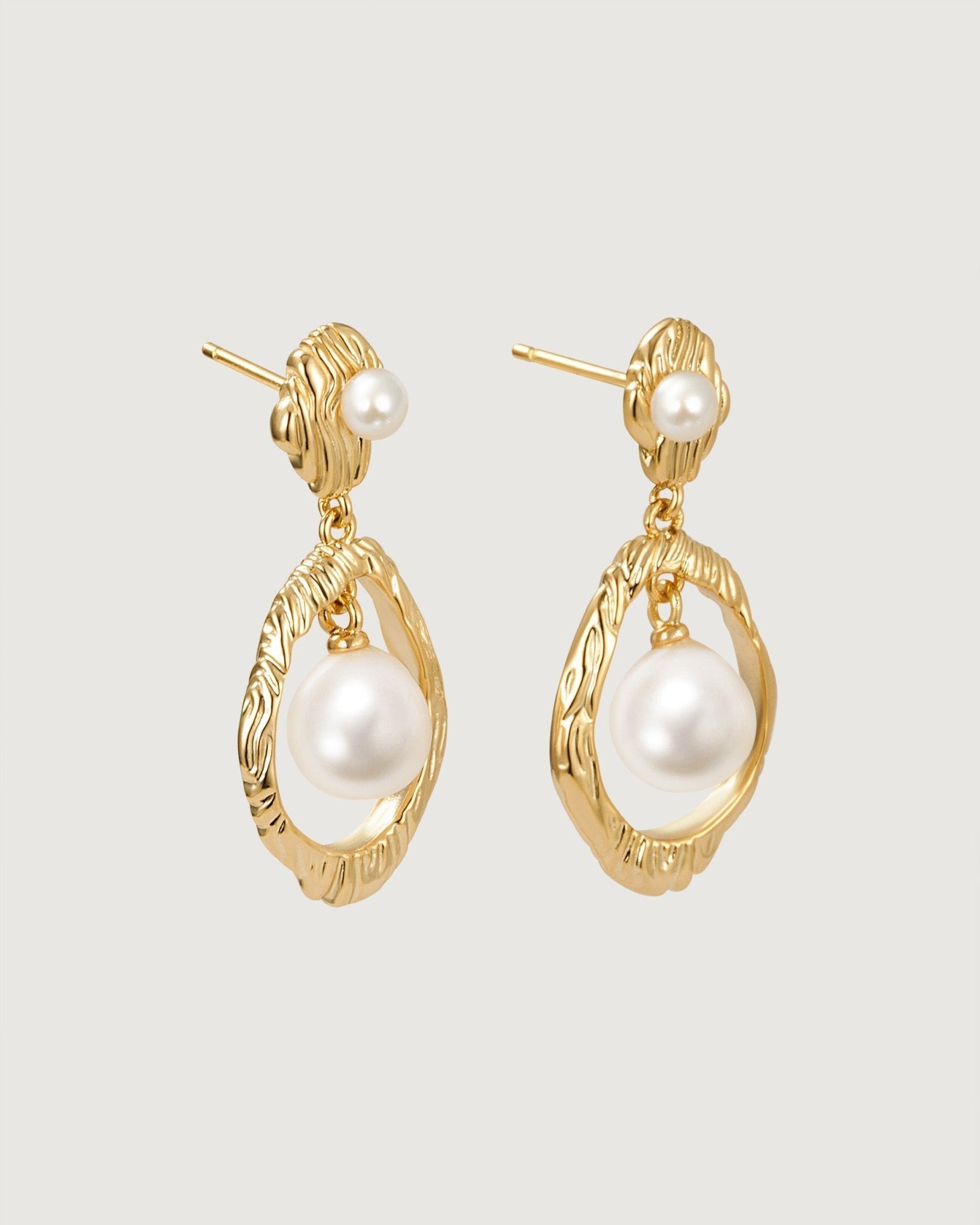 time-baroque-pearl-earring-427258_c26504a6-69c2-4cd3-a9dc-0f2d8e92ba7a.jpg