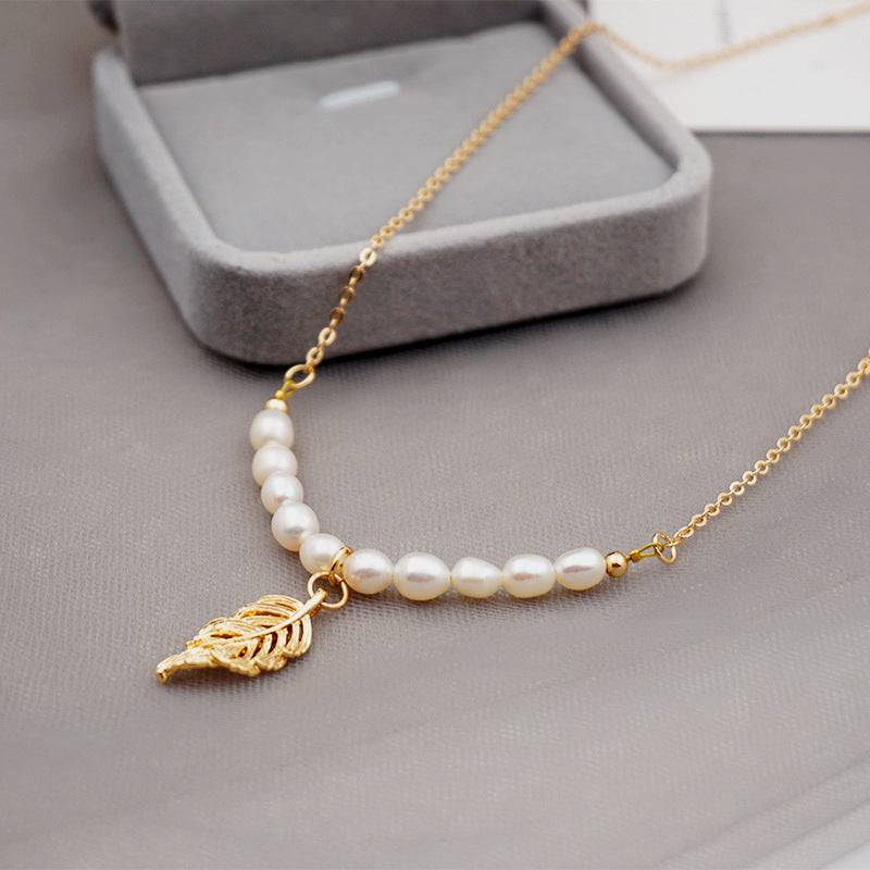 wh-necklaces-leaf-lecie-pendant-pearl-necklace-36626270879977_2c7c6992-a22f-4590-8fd2-d16b10fdd710.jpg