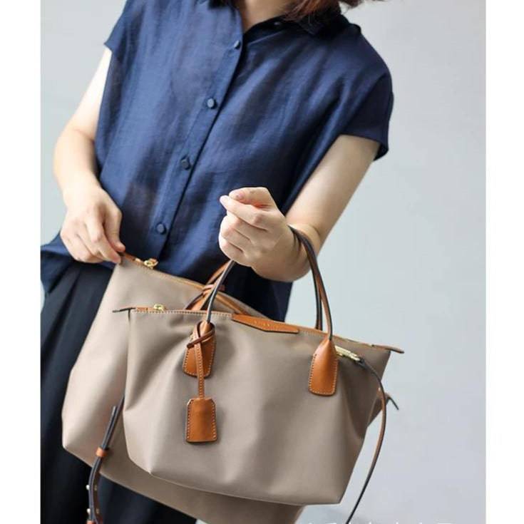 xq-handbags-emtote-shoulder-bag-sand-36626718359785_bcf2104d-2c0b-4be2-a579-3797e9393f4c.jpg