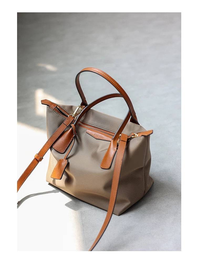 xq-handbags-emtote-shoulder-bag-sand-36626718458089_a1aba731-df16-4d9e-9398-197df5bf5d29.jpg