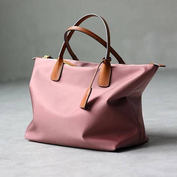 xq-handbags-small-pink-emtote-shoulder-bag-pink-36626716164329_97e3bb19-b259-4b5b-b68e-24e897f48b15.jpg