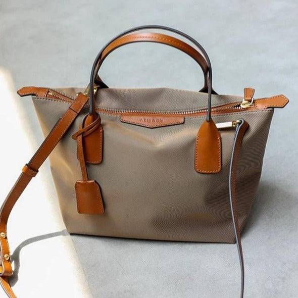 xq-handbags-small-sand-emtote-shoulder-bag-sand-36626718130409_67cec593-e7b0-4a1a-ada0-54ca64c00937.jpg